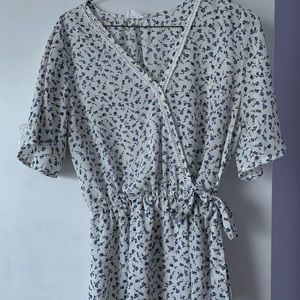 White and blue floral top